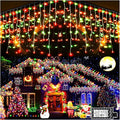 KNONEW Christmas Lights Outdoor Decorations 400 LED 33ft 8 Modes Curtain Fairy String Light with 75 Drops, Clear Wire LED String Light Indoor Decor for Wedding Party Christmas (Red and Green)